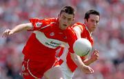 26 June 2005; Eoin Bradley, Derry, in action against Aaron Kernan, Armagh. Bank of Ireland Ulster Senior Football Championship Semi-Final, Armagh v Derry, Casement Park, Belfast. Picture Credit; David Maher / SPORTSFILE