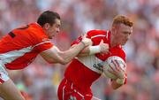 26 June 2005; Fergal Doherty, Derry, in action against Oisin McConville, Armagh. Bank of Ireland Ulster Senior Football Championship Semi-Final, Armagh v Derry, Casement Park, Belfast. Picture Credit; David Maher / SPORTSFILE
