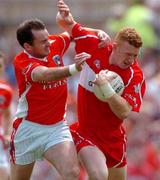 26 June 2005; Fergal Doherty, Derry, in action against Aidan O'Rourke, Armagh. Bank of Ireland Ulster Senior Football Championship Semi-Final, Armagh v Derry, Casement Park, Belfast. Picture Credit; David Maher / SPORTSFILE