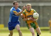26 June 2005; Brian Roper, Donegal, in action against, Kevin Manning, Wicklow. Bank of Ireland All-Ireland Senior Football Championship Qualifier, Round 1, Wicklow v Donegal, County Grounds, Aughrim, Co. Wicklow. Picture Credit; Matt Browne / SPORTSFILE