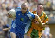 26 June 2005; Brendan Daly, Wicklow, in action against Brendan Devenney, Donegal. Bank of Ireland All-Ireland Senior Football Championship Qualifier, Round 1, Wicklow v Donegal, County Grounds, Aughrim, Co. Wicklow. Picture Credit; Matt Browne / SPORTSFILE