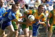 26 June 2005; Neil Gallagher, Donegal, in action against Wayne O'Gorman, Wicklow. Bank of Ireland All-Ireland Senior Football Championship Qualifier, Round 1, Wicklow v Donegal, County Grounds, Aughrim, Co. Wicklow. Picture Credit; Matt Browne / SPORTSFILE