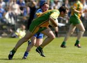 26 June 2005; Shane Carr, Donegal, in action against Thomas Harney, Wicklow. Bank of Ireland All-Ireland Senior Football Championship Qualifier, Round 1, Wicklow v Donegal, County Grounds, Aughrim, Co. Wicklow. Picture Credit; Matt Browne / SPORTSFILE