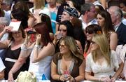 26 June 2005; Race fans watch the Budweiser Irish Derby. Curragh Racecourse, Co. Kildare. Picture credit; Damien Eagers / SPORTSFILE