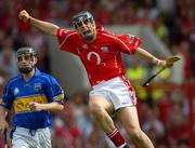 26 June 2005; Cork substitute Neil Ronan celebrates after scoring a point midway through the second half. Guinness Munster Senior Hurling Championship Final, Cork v Tipperary, Pairc Ui Chaoimh, Cork. Picture Credit; Ray McManus / SPORTSFILE