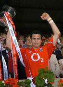 26 June 2005; Cork's Sean Og O'hAilpin lifts the Munster Hurling trophy after victory over Tipperary. Guinness Munster Senior Hurling Championship Final, Cork v Tipperary, Pairc Ui Chaoimh, Cork. Picture Credit; Ray McManus / SPORTSFILE