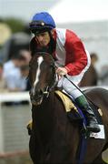 25 June 2005; Red Bloom, with Johnny Murtagh up, canters to the start of the Audi Pretty Polly Stakes. Curragh Racecourse, Co. Kildare. Picture credit; Damien Eagers / SPORTSFILE