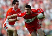 26 June 2005; Eoin Bradley, Derry, in action against Aaron Kernan, Armagh. Bank of Ireland Ulster Senior Football Championship Semi-Final, Armagh v Derry, Casement Park, Belfast. Picture Credit; David Maher / SPORTSFILE