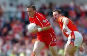 26 June 2005; Paddy Bradley, Derry, in action against Enda McNulty, Armagh. Bank of Ireland Ulster Senior Football Championship Semi-Final, Armagh v Derry, Casement Park, Belfast. Picture Credit; David Maher / SPORTSFILE