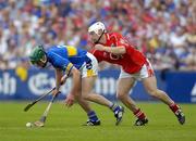 26 June 2005; Declan Fanning, Tipperary, in action against Timmy McCarthy, Cork. Guinness Munster Senior Hurling Championship Final, Cork v Tipperary, Pairc Ui Chaoimh, Cork. Picture Credit; Ray McManus / SPORTSFILE