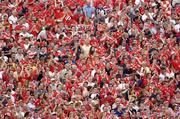 26 June 2005; Cork fans cheer on their side during the game. Guinness Munster Senior Hurling Championship Final, Cork v Tipperary, Pairc Ui Chaoimh, Cork. Picture Credit; Ray McManus / SPORTSFILE