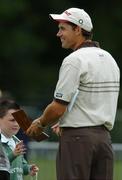 28 June 2005; Padraig Harrington signs an autograph for a fan during practice in advance of the Smurfit European Open. K Club, Straffan, Co. Kildare Picture credit; David Maher / SPORTSFILE