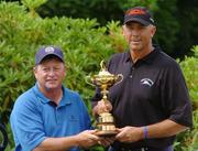 29 June 2005; Tom Lehman, right, US captain, and Ian Woosnam, European captain, hold the Ryder Cup after a press conference to announce the vice-captains for the 2006 Ryder Cup. K Club, Straffan, Co. Kildare. Picture credit; David Maher / SPORTSFILE