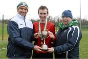 12 February 2014; IT Carlow 'C' captain Fintan White receives the cup from Adrian Forka, Umbro, and Padraig Carney, CUFL. UMBRO CUFL Second Division Final, Athlone IT 'B' v IT Carlow 'C', Athlone Institute of Technology Arena, Athlone, Co. Westmeath. Picture credit: Barry Cregg / SPORTSFILE