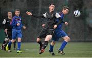 12 February 2014; Ronan Doherty, IT Carlow 'B', in action against Colm Begley, Trinity College, before the match was abandoned due to high winds. UMBRO CUFL First Division Final, Trinity College v IT Carlow 'B', Leixlip United, Leixlip, Co. Kildare. Picture credit: Brendan Moran / SPORTSFILE