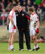 9 February 2014; Gavin Devlin, Tyrone selector, centre, speaking to Tyrone players Emmett McKenna, left, and Peter Hughes. Allianz Football League Division 1 Round 2, Tyrone v Mayo, Healy Park, Omagh, Co. Tyrone. Picture credit: Oliver McVeigh / SPORTSFILE
