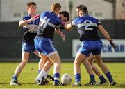 13 February 2014; Caolan O'Boyle, University of Ulster Jordanstown, in action against, from left, Ross Sheridan, Ciarán Reddin, Bryan Menton and Kevin O'Brien, Dublin Institute of Technology. Irish Daily Mail HE GAA Sigerson Cup 2014 Quarter-Final, Dublin Institute of Technology v University of Ulster Jordanstown, Parnells GAA Club, Coolock, Dublin. Picture credit: Piaras Ó Mídheach / SPORTSFILE