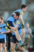 13 February 2014; University College Dublin's David Byrne is held aloft by team-mate Shane McEntee as they celebrate at the final whistle. Irish Daily Mail HE GAA Sigerson Cup 2014, Quarter-Final, University College Dublin v Dublin City University, UCD, Belfield, Dublin. Picture credit: Pat Murphy / SPORTSFILE