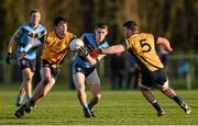 13 February 2014; Brian Fenton, University College Dublin, in action against Eoin O'Connor, left, and Pete Dooney, Dublin City University. Irish Daily Mail HE GAA Sigerson Cup 2014, Quarter-Final, University College Dublin v Dublin City University, UCD, Belfield, Dublin. Picture credit: Pat Murphy / SPORTSFILE