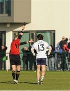 13 February 2014; Jamie Clarke, University of Ulster Jordanstown, is shown the black card by Anthony Nolan, referee. Irish Daily Mail HE GAA Sigerson Cup 2014 Quarter-Final, Dublin Institute of Technology v University of Ulster Jordanstown, Parnells GAA Club, Coolock, Dublin. Picture credit: Piaras Ó Mídheach / SPORTSFILE