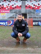 14 February 2014; Referee Leighton Hodges insects the pitch before calling the match off due to the Ravenhill pitch being water logged. Celtic League 2013/14, Round 14, Ulster v Scarlets, Ravenhill Park, Belfast, Co. Antrim. Picture credit: John Dickson / SPORTSFILE