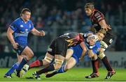 14 February 2014; Ian Madigan, Leinster, is tackled by Lewis Evans, Newport Gwent Dragons. Celtic League 2013/14 Round 14, Leinster v Newport Gwent Dragons, RDS, Ballsbridge, Dublin. Picture credit: Ramsey Cardy / SPORTSFILE