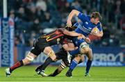 14 February 2014; Jordi Murphy, Leinster, is tackled by Lewis Evans, left, and Netani Talei, Newport Gwent Dragons. Celtic League 2013/14 Round 14, Leinster v Newport Gwent Dragons, RDS, Ballsbridge, Dublin. Picture credit: Ramsey Cardy / SPORTSFILE