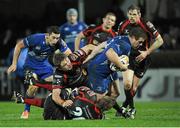 14 February 2014; Sean Cronin, Leinster, is tackled by Jevon Groves, on the ground, and Lewis Evans, Newport Gwent Dragons. Celtic League 2013/14 Round 14, Leinster v Newport Gwent Dragons, RDS, Ballsbridge, Dublin. Picture credit: Piaras Ó Mídheach / SPORTSFILE