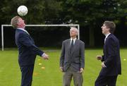 23 June 2005; The Minister for Arts, Sport and Tourism, Mr. John O'Donoghue T.D., today announced an allocation of 2 million euro from the Irish Sports Council to the FAI for 2005 aimed at supporting their Technical Development Plan, with a particular emphasis on participation in soccer at underage level. With the Minister at the announcement are Chief Executive of the FAI John Delaney, right, and Irish Sports Council Chief Executive John Treacy, centre. Parkside Sports Community Centre, Cabra, Dublin. Picture credit; Brian Lawless / SPORTSFILE