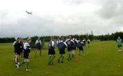 30 June 2005; The Republic of Ireland squad pictured during Youth Olympic squad training as overhead a plane makes its approach to Dublin airport, the European Youth Olympics will take place in Lignano, Italy. AUL Complex, Clonshaugh, Dublin. Picture Credit; Damien Eagers / SPORTSFILE