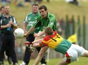 2 July 2005; Conor Fitzgerald, Limerick,is tackled by Paul Kelly, Carlow. Bank of Ireland All-Ireland Senior Football Championship Qualifier, Round 2, Carlow v Limerick, Dr. Cullen Park, Carlow. Picture credit; Matt Browne / SPORTSFILE
