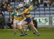 2 July 2005; Sean McMahon, Clare, is tackled by Mick O'Hara, Offaly. Guinness All-Ireland Senior Hurling Championship Qualifier, Round 2, Offaly v Clare, O'Moore Park, Portlaoise, Co. Laois. Picture credit; Damien Eagers / SPORTSFILE