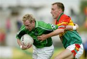 2 July 2005; Stephen Kelly, Limerick, in action against Richard Sinnott, Carlow. Bank of Ireland All-Ireland Senior Football Championship Qualifier, Round 2, Carlow v Limerick, Dr. Cullen Park, Carlow. Picture credit; Matt Browne / SPORTSFILE