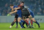 14 February 2014; Sean Cronin, Leinster, is tackled by Owen Evans and Rob Sidoli, 5, Newport Gwent Dragons. Celtic League 2013/14 Round 14, Leinster v Newport Gwent Dragons, RDS, Ballsbridge, Dublin. Picture credit: Ramsey Cardy / SPORTSFILE