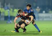 14 February 2014; Matthew Pewtner, Newport Gwent Dragons, is tackled by Zane Kirchner. Celtic League 2013/14 Round 14, Leinster v Newport Gwent Dragons, RDS, Ballsbridge, Dublin. Picture credit: Ray Lohan / SPORTSFILE