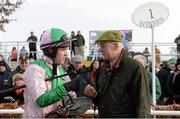 15 February 2014; Jockey Brian O'Connell speaking with trainer Tom Taaffe after victory in the Red Mills Steeplechase on Argocat. Gowran Park, Gowran, Co. Kilkenny. Picture credit: Barry Cregg / SPORTSFILE