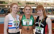 15 February 2014; Winner of the Women's Long Jump event Kelly Proper, Ferrybank A.C., Waterford, centre, second place Sarah McCarthy, Mid Sutton A.C., Dublin, left, and third place Annie Stafford, Menapians A.C., Wexford, right. Woodie’s DIY National Senior Indoor Track and Field Championships, Athlone Institute of Technology International Arena, Athlone, Co. Westmeath. Picture credit: Stephen McCarthy / SPORTSFILE