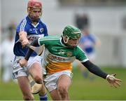 16 February 2014; Stephen Quirke, Offaly, in action against John Delaney, Laois. Allianz Hurling League, Division 1B, Round 1, Offaly v Laois, O'Connor Park, Tullamore, Co. Offaly. Picture credit: David Maher / SPORTSFILE