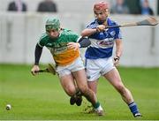 16 February 2014; Stephen Quirke, Offaly, in action against John A Delaney, Laois. Allianz Hurling League, Division 1B, Round 1, Offaly v Laois, O'Connor Park, Tullamore, Co. Offaly. Picture credit: David Maher / SPORTSFILE