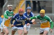 16 February 2014; James Rigney, Offaly, in action against Joe Fitzpatrick, Laois. Allianz Hurling League, Division 1B, Round 1, Offaly v Laois, O'Connor Park, Tullamore, Co. Offaly. Picture credit: David Maher / SPORTSFILE