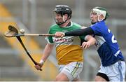 16 February 2014; Dan Kelliher, Offaly, in action against Ross King, Laois. Allianz Hurling League, Division 1B, Round 1, Offaly v Laois, O'Connor Park, Tullamore, Co. Offaly. Picture credit: David Maher / SPORTSFILE