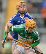 16 February 2014; Sean Gardner, Offaly, in action against John Purcell, Laois. Allianz Hurling League, Division 1B, Round 1, Offaly v Laois, O'Connor Park, Tullamore, Co. Offaly. Picture credit: David Maher / SPORTSFILE