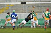 16 February 2014; Offaly goalkeeper James Dempsey and team-mate James Rigney, right, save a penalty from Stephen Maher, Laois. Allianz Hurling League, Division 1B, Round 1, Offaly v Laois, O'Connor Park, Tullamore, Co. Offaly. Picture credit: David Maher / SPORTSFILE