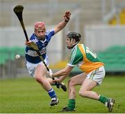 16 February 2014; Kevin Connolly, Offaly, in action against John Delaney, Laois. Allianz Hurling League, Division 1B, Round 1, Offaly v Laois, O'Connor Park, Tullamore, Co. Offaly. Picture credit: David Maher / SPORTSFILE