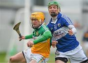 16 February 2014; James Rigney, Offaly, in action against Tommy Fitzgerald, Laois. Allianz Hurling League, Division 1B, Round 1, Offaly v Laois, O'Connor Park, Tullamore, Co. Offaly. Picture credit: David Maher / SPORTSFILE