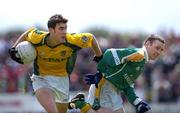 3 July 2005; Brian Farrell, Meath, is tackled by Dermot Reynolds, Leitrim, Bank of Ireland All-Ireland Senior Football Championship Qualifier, Round 2, Leitrim v Meath, O'Moore Park, Carrick-on-Shannon, Co. Leitrim. Picture credit; Ray McManus / SPORTSFILE
