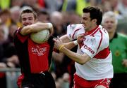 3 July 2005; Ronan Murtagh, Down, in action against Kevin McGuckin, Derry. Bank of Ireland All-Ireland Senior Football Championship Qualifier, Round 2, Down v Derry, Pairc An Iuir, Newry, Co. Down. Picture credit; David Maher / SPORTSFILE