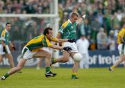 3 July 2005; Christopher Carroll, Leitrim, is tackled by Anthony Moyles, Meath. Bank of Ireland All-Ireland Senior Football Championship Qualifier, Round 2, Leitrim v Meath, O'Moore Park, Carrick-on-Shannon, Co. Leitrim. Picture credit; Ray McManus / SPORTSFILE