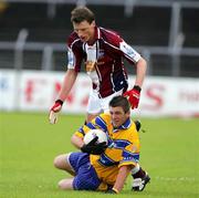 3 July 2005; Enda Coughlan, Clare, in action against Colin Galligan, Westmeath. Bank of Ireland All-Ireland Senior Football Championship Qualifier, Round 2, Clare v Westmeath, Cusack Park, Ennis, Co. Clare. Picture credit; Kieran Clancy / SPORTSFILE