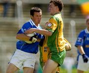 3 July 2005; Martin Cahill, Cavan, in action against Eamon McGee, Donegal. Bank of Ireland All-Ireland Senior Football Championship Qualifier, Round 2, Cavan v Donegal, Kingspan Breffni Park, Cavan. Picture credit; Pat Murphy / SPORTSFILE